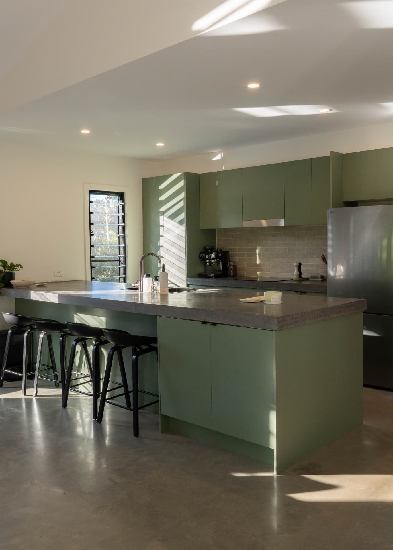 Kitchen fit-out with custom joinery and stone benchtops